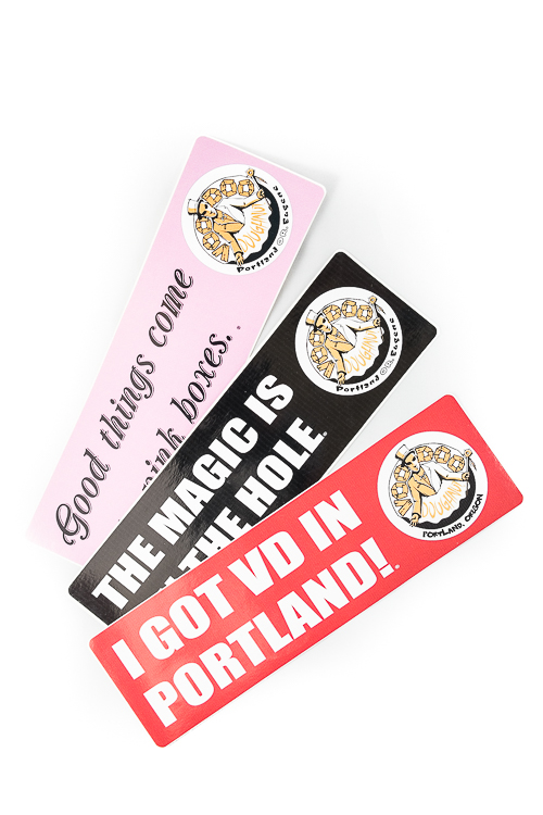 three rectangular stickers with logo and slogans