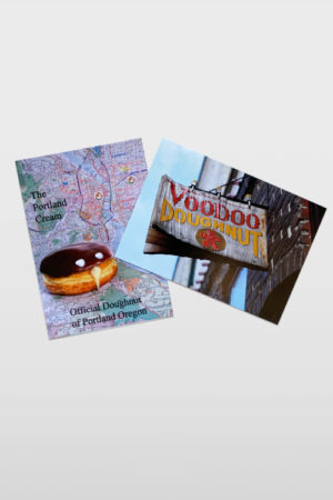 Two postcards showing Portland map and Voodoo Doughnut sign