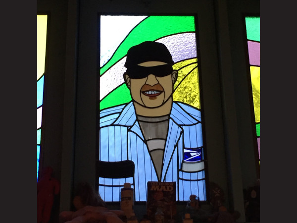 Spike the Mailman | Stained Glass Window at Voodoo Doughnut