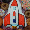 Space Ship Centerpiece Doughnut with more doughnuts around it