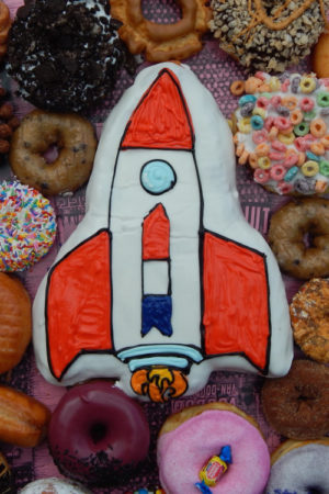 Space Ship Centerpiece Doughnut with more doughnuts around it