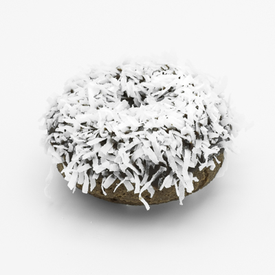 Chocolate cake doughnut with chocolate frosting with white coconut flakes.