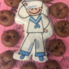 Doughnut shaped and frosted with a sailor stick figure saluting