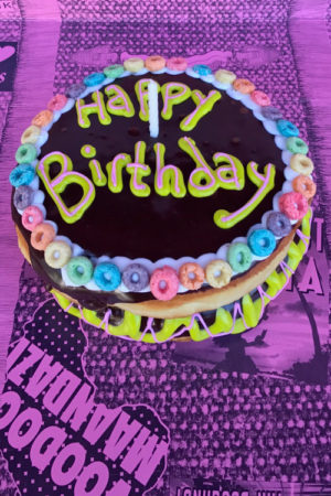 Happy Birthday Chocolate Iced Doughnut with Candle