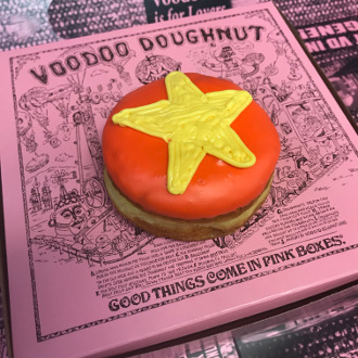 Steven Universe doughnut -- Red icing with a yellow star on a round doughnut