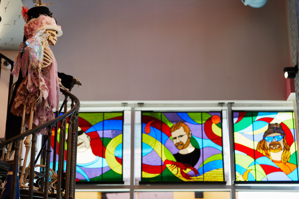 Image showing the tri panel stained glass window and the pirate skeleton