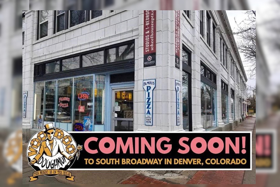 Street corner at South Broadway with banner: Coming Soon Voodoo Doughnut logo