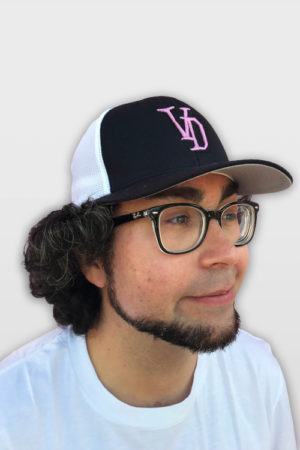 Man wearing the Black and White Flexfit hat