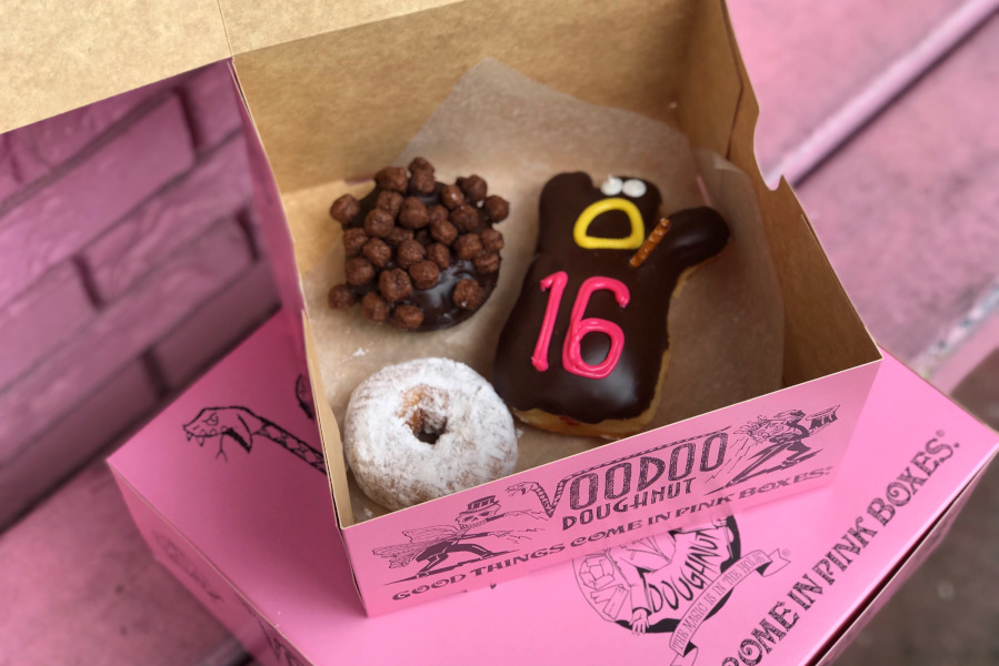Pink Doughnut box with Voodoo Doll doughnut with 16