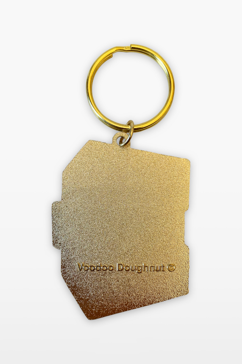 Back of keychain - gold with Voodoo Doughnut copyright