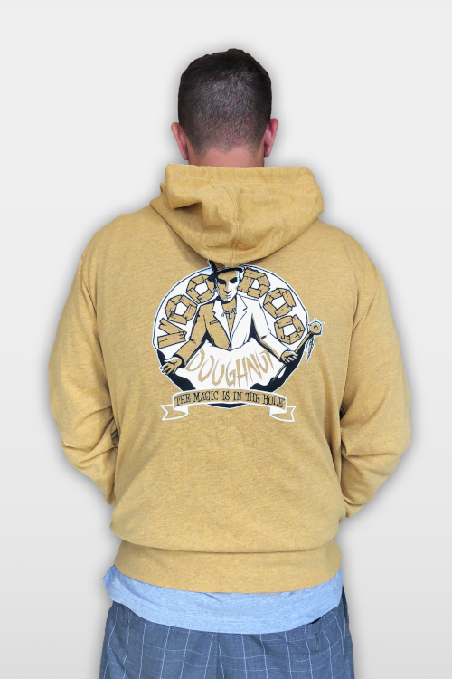 man wearing gold hoodie seen from back