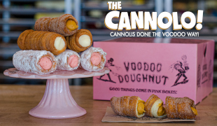 Cannolo - Press - Text Platter with six Cannolo stacked and pink box in background Cannnolis done the voodoo way!