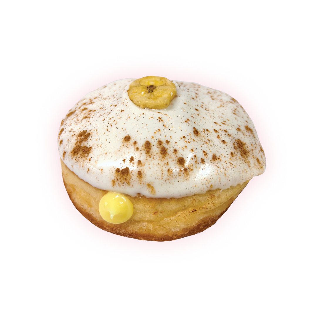 shows banana cream pie doughnut Filled with banana Bavarian cream, dipped in Voonilla frosting and topped with cinnamon and banana chip.