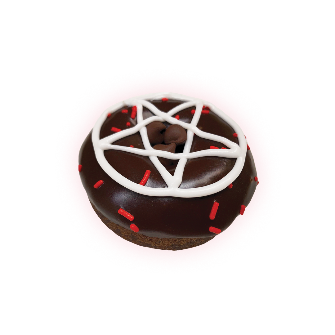 Devil’s food cake with chocolate frosting, red sprinkles, a vanilla frosting pentagram, and chocolate chips in the middle.