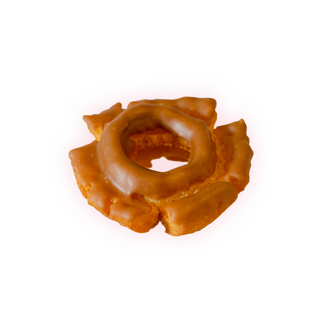 buttermilk cake doughnut dipped in maple frosting