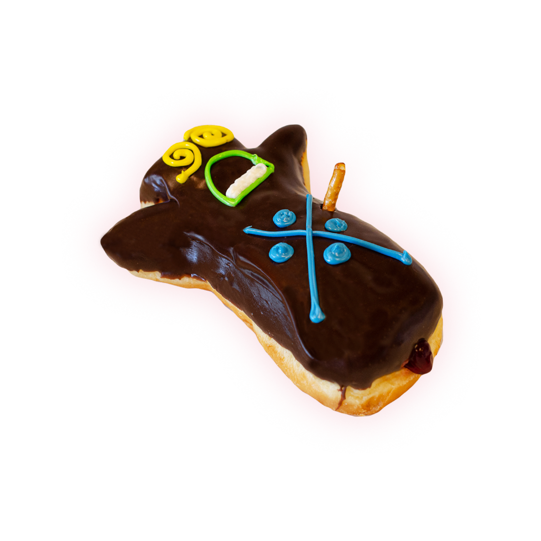 shows doughnut Filled with raspberry, dipped in chocolate frosting, and poked with a pretzel stake through its heart.